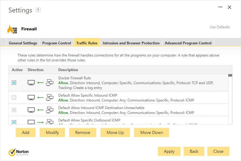 The Norton Security Firewall Settings - Traffic Rules tab showing a list of firewall rules.