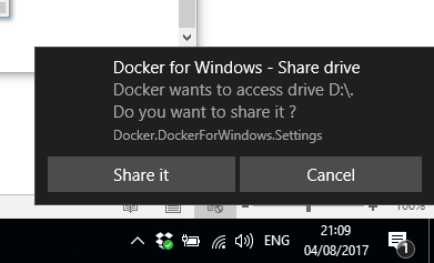 Image of the Docker for Windows - Share drive popup message with the text "Dockeer wants to access drive D:\. Do you want to share it? Docker.DockerForWindows.Settings". It has two buttons: Share it and Cancel.